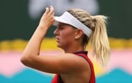 Marta Kostyuk looks on during a match at the BNP Paribas Open
